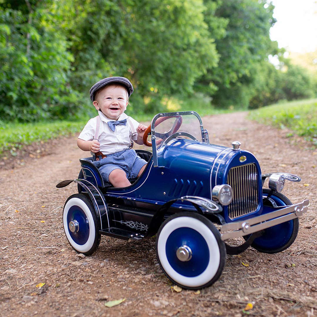 A dapper baby in an antique car. - Katrina Serene Photography